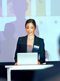 woman speaking confidently during presentation