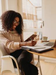 woman taking course online at home